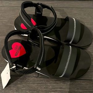 NWOT Love Moschino black sandals chic and lightweight US sz 6-7 fits 37-38